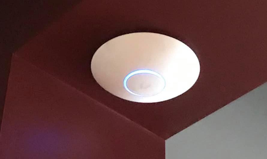 Ceiling-mounted Wi-Fi access point installed by Internet Communications Inc.