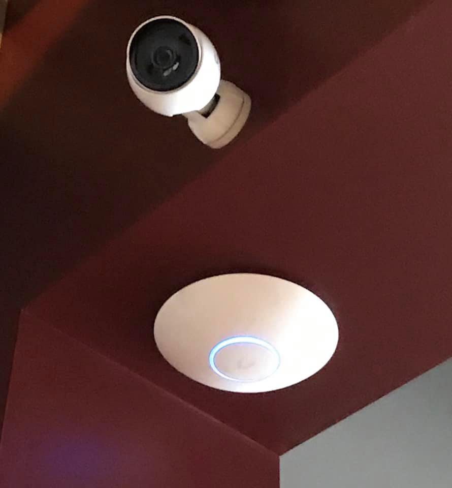 Security camera and Wi-Fi access point installed by Internet Communications Inc.